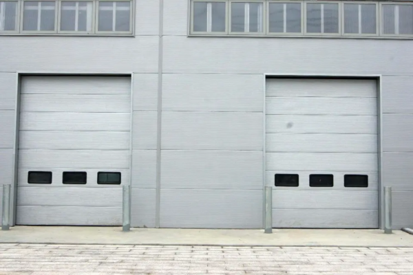 Venta caliente puerta de elevación industrial personalizada con vidrio